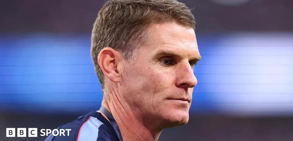 Coach looking focused during a match