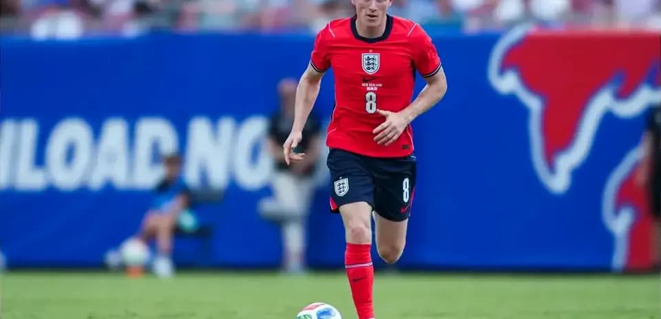 Player running with the ball during a soccer match