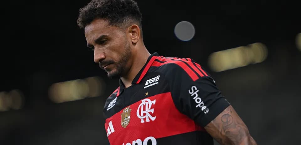 Player wearing Flamengo jersey walking off the field
