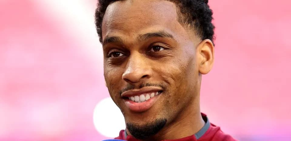 Player speaking during a press event with microphone