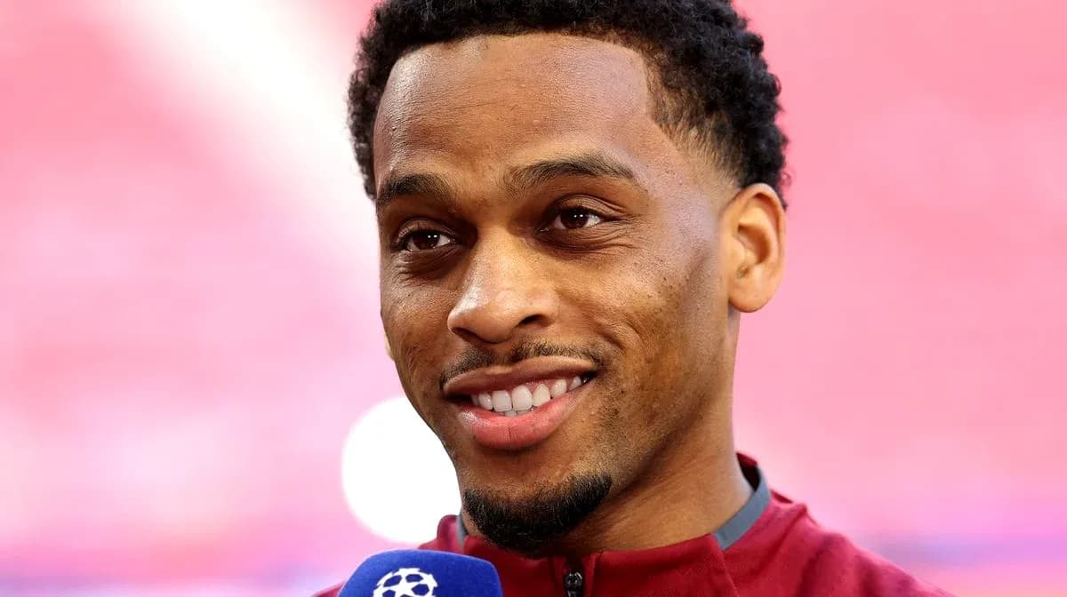 Player speaking during a press event with microphone
