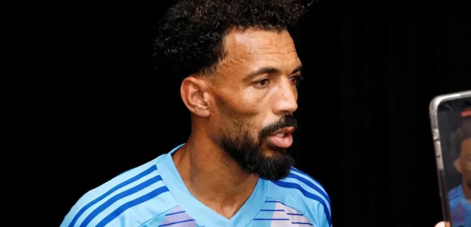 Player speaking during interview in FIFA jersey