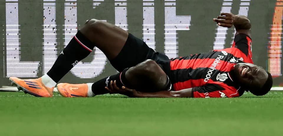 Player lying on ground, injured during match