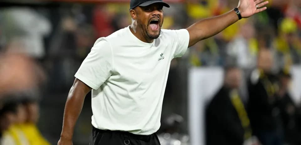 Coach instructing players during a match