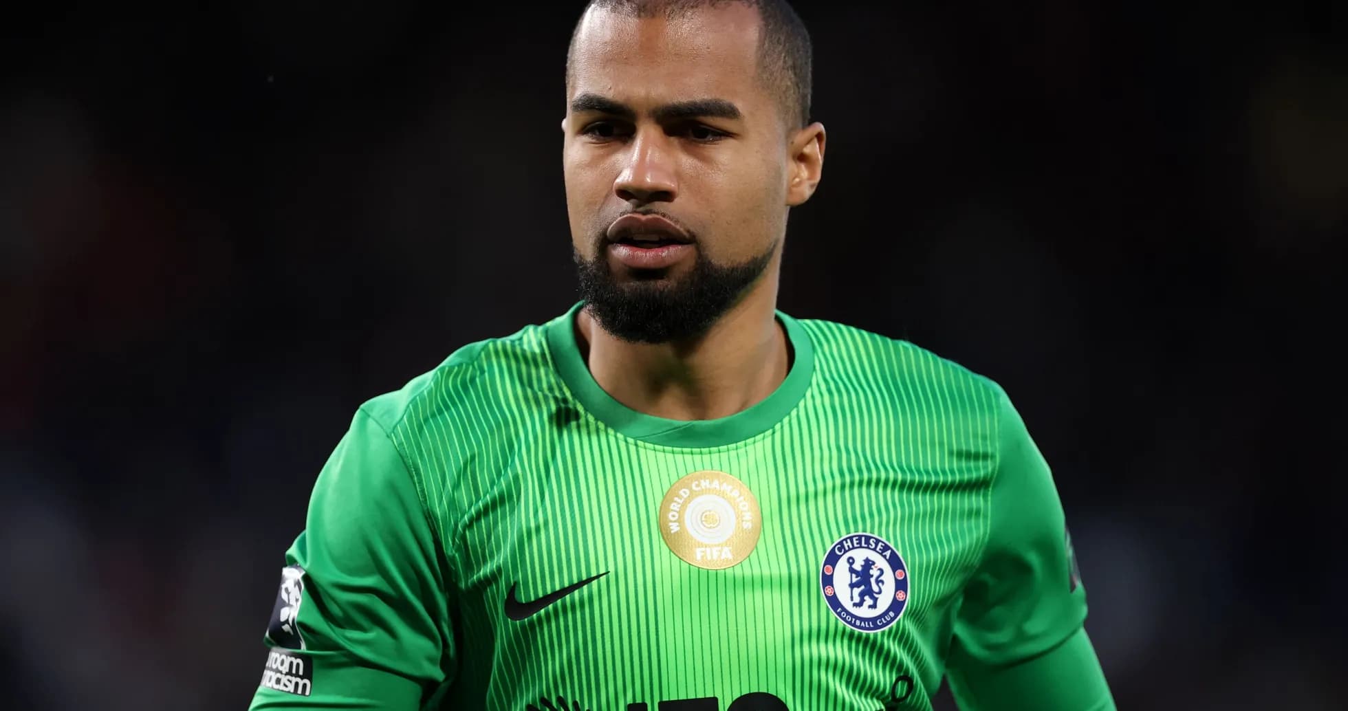 Goalkeeper in green kit during match