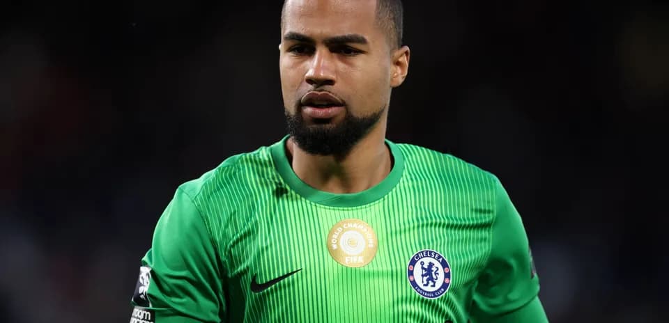 Goalkeeper in green kit during match