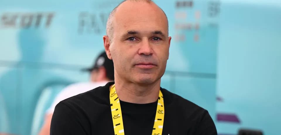 Man with a lanyard at cycling event