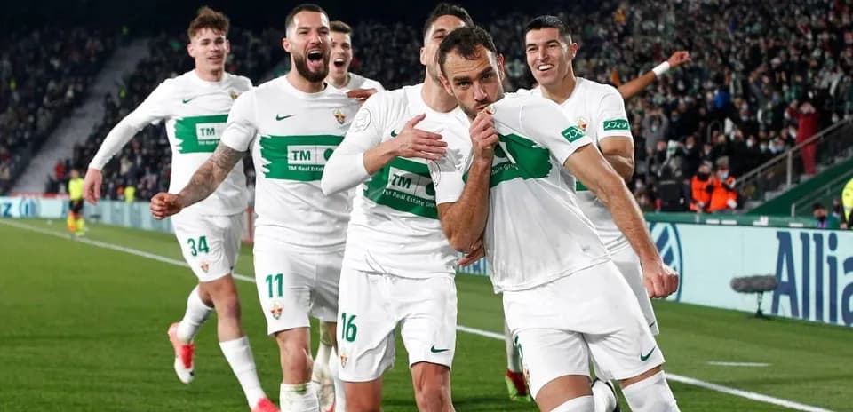 Elche players celebrating a goal during match