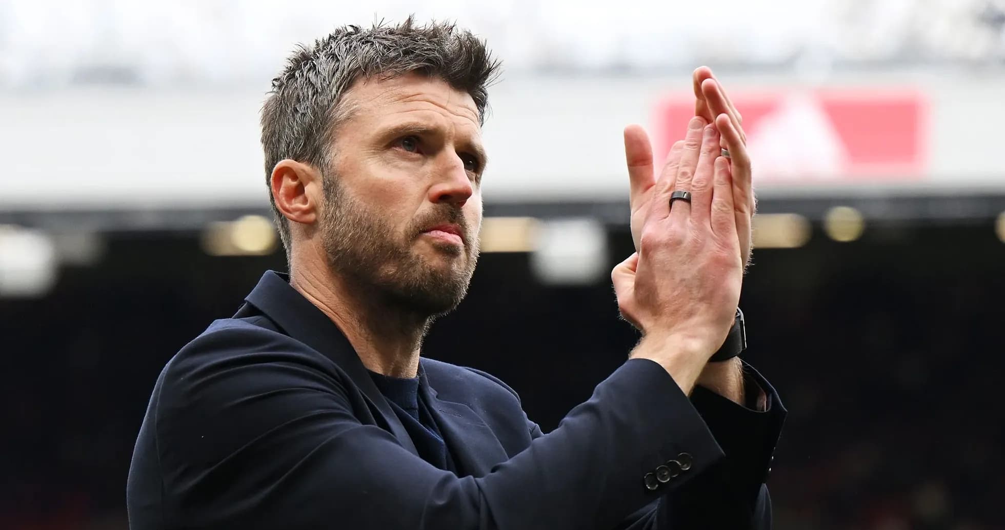 Man applauding in stadium during match
