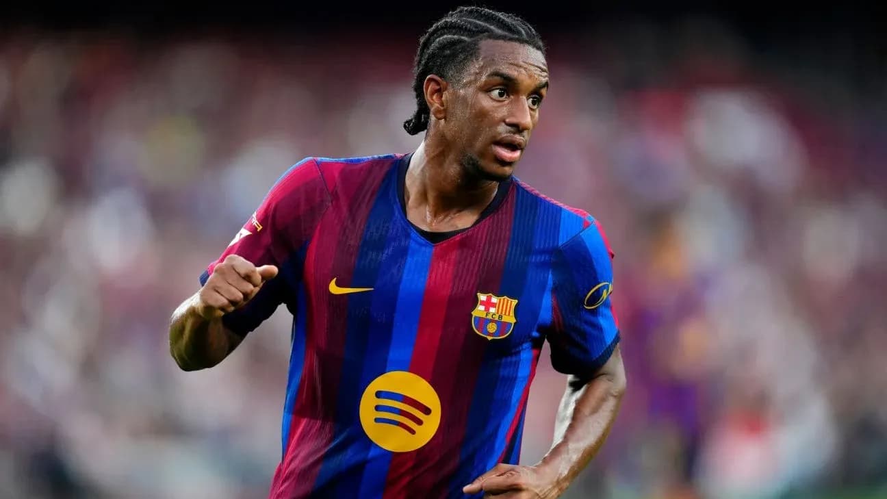 Player in FC Barcelona kit running on field
