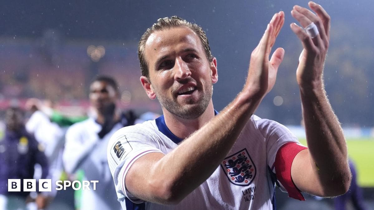 Player applauding fans after a match