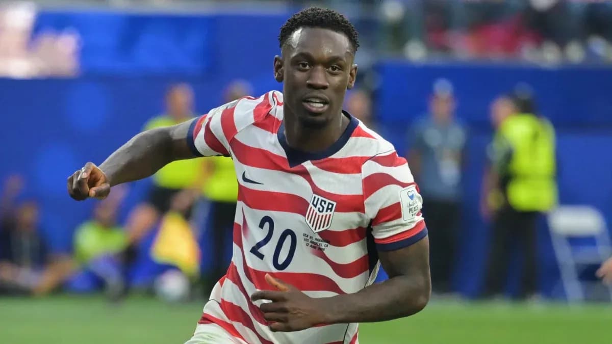 Player wearing USA jersey celebrating on the field