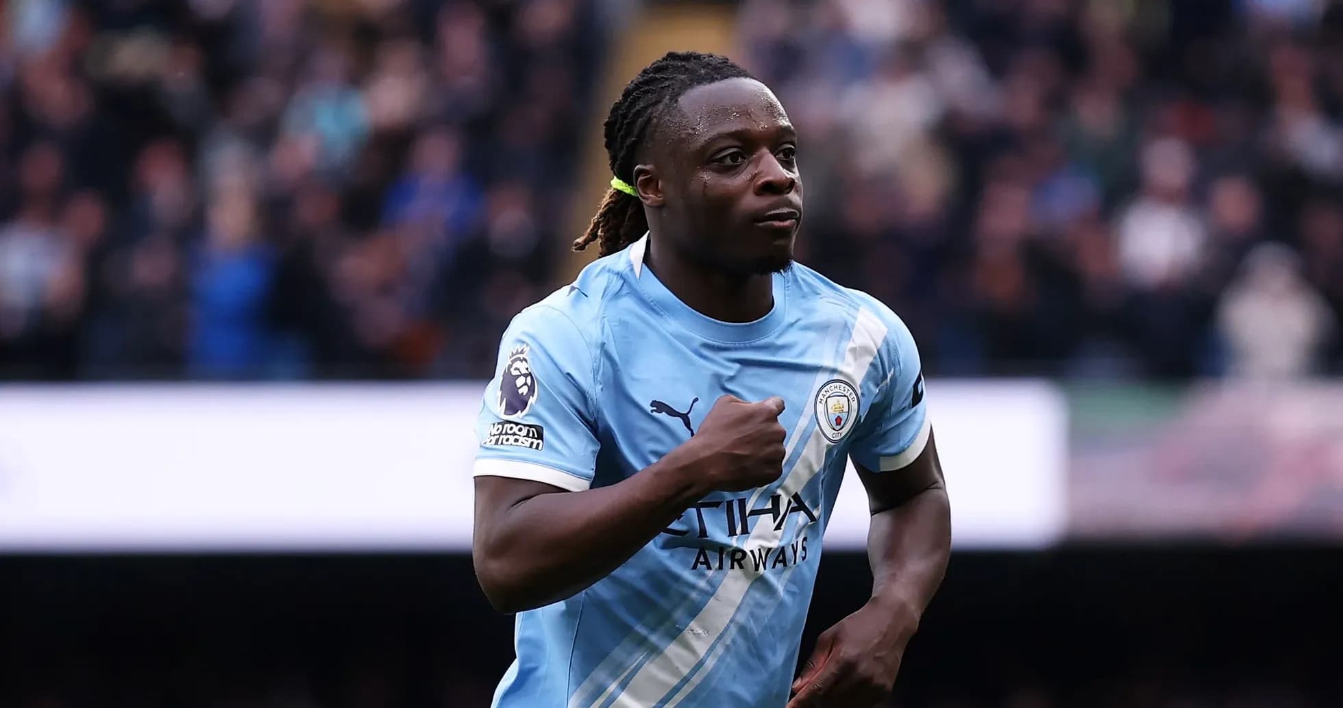 Manchester City player celebrating after scoring goal