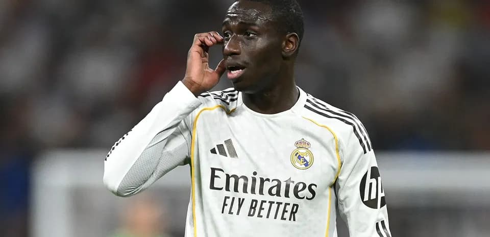 Player in Real Madrid kit during match action