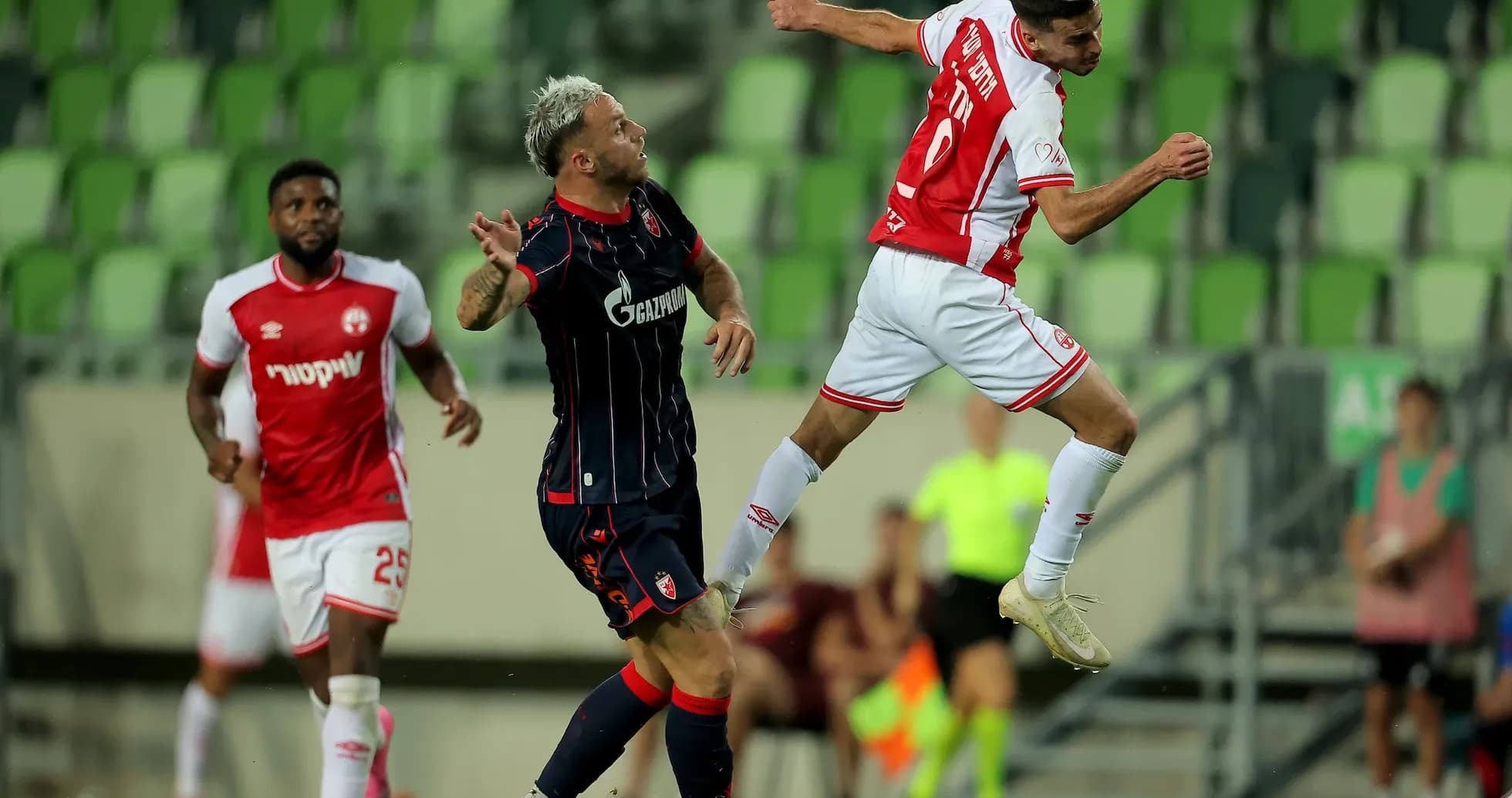 Player heading the ball during FK Crvena Zvezda match