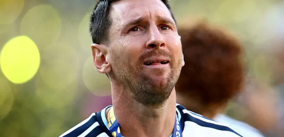 Player with medal celebrating victory after match