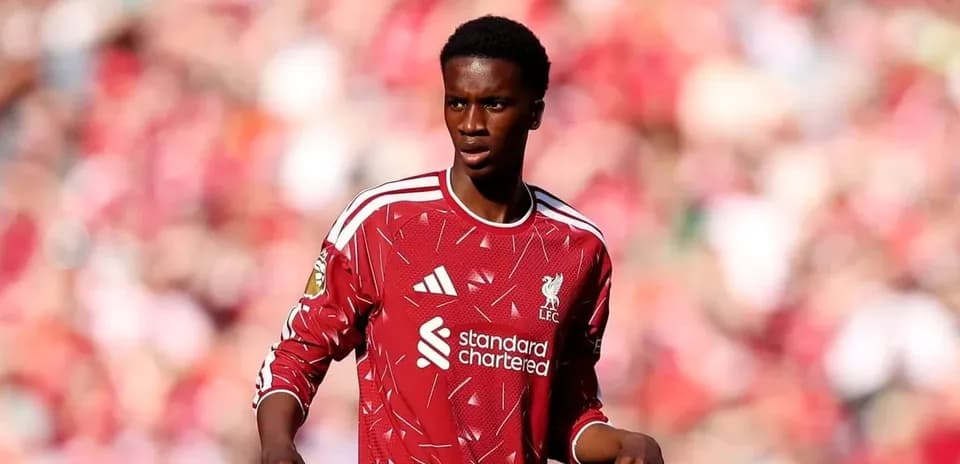 Player in Liverpool kit on the pitch