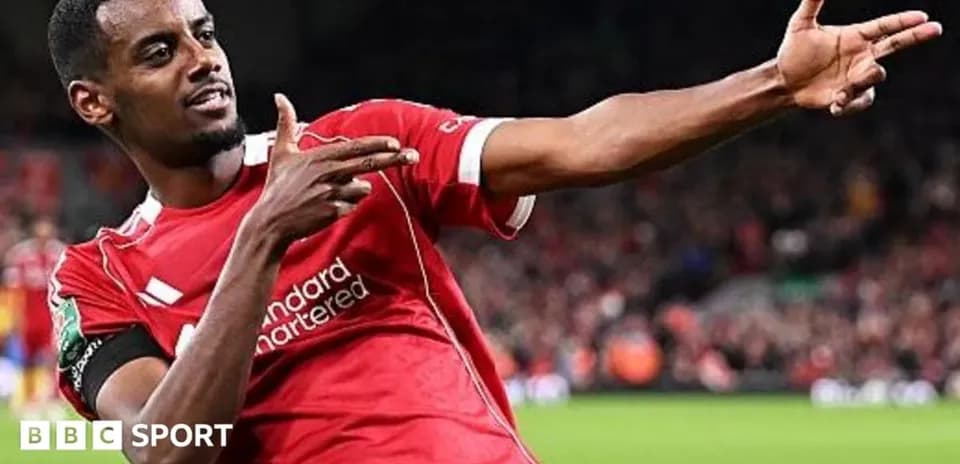 Player celebrating goal in Liverpool jersey
