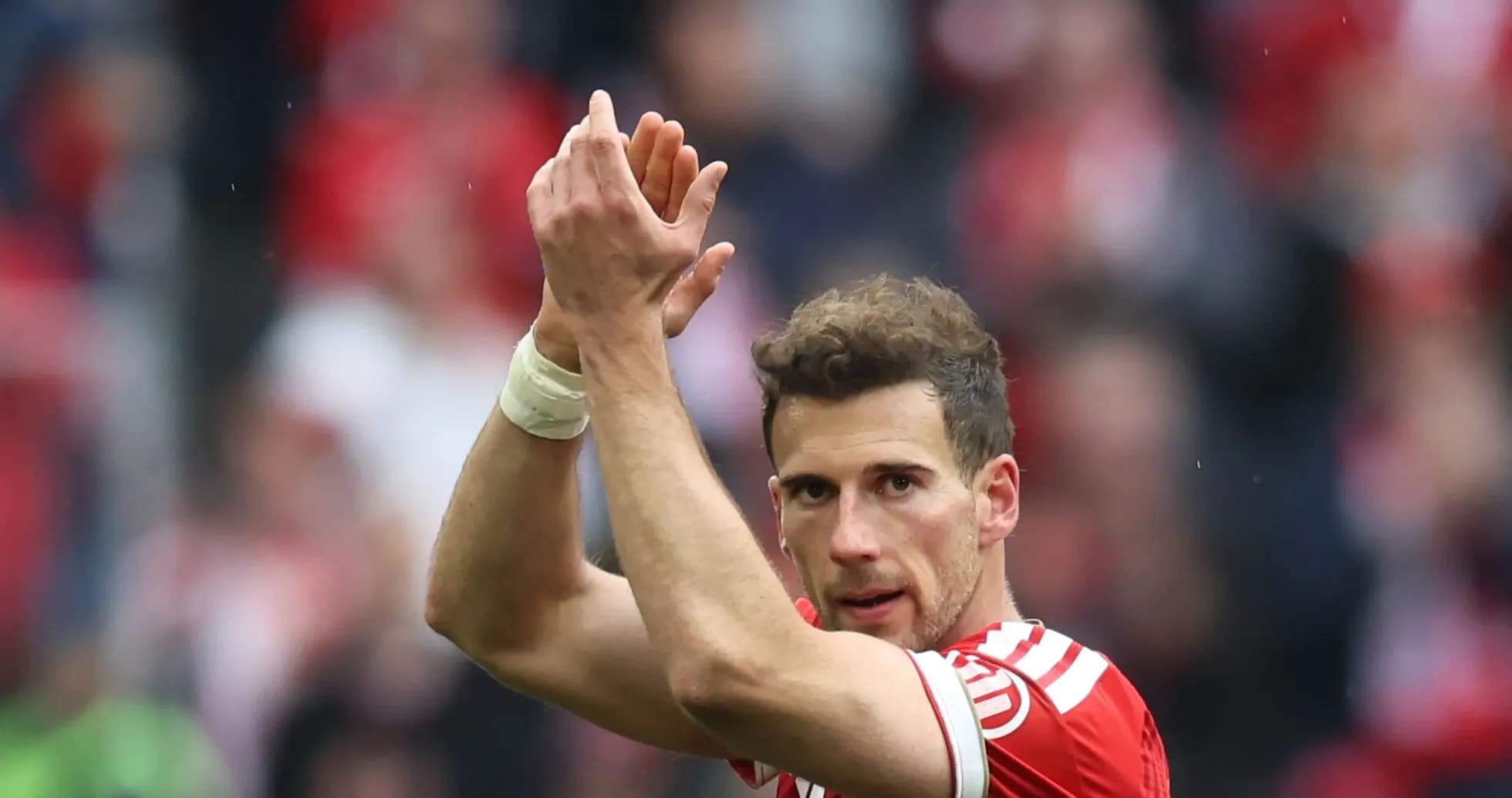 Player applauding fans after the match