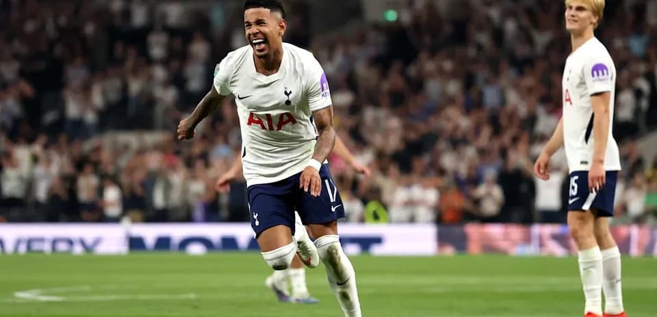 Tottenham player celebrating a goal on the pitch