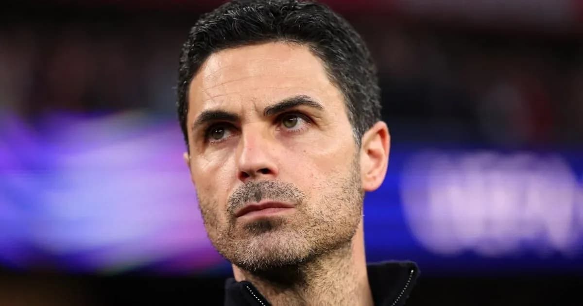 Coach observing during a match at the stadium