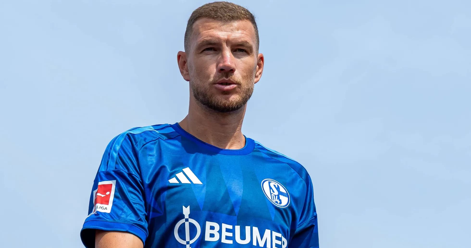 Player wearing Schalke 04 jersey outdoors