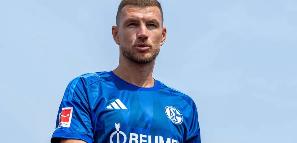 Player wearing Schalke 04 jersey outdoors