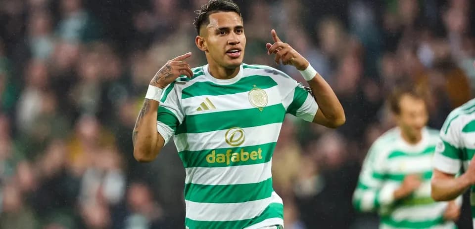 Celtic player celebrating a goal on the field