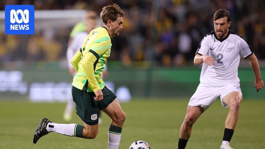 Player dribbling the ball during match against New Zealand