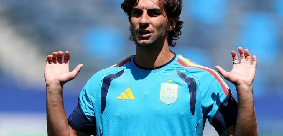 Player in training shirt gesturing during practice session