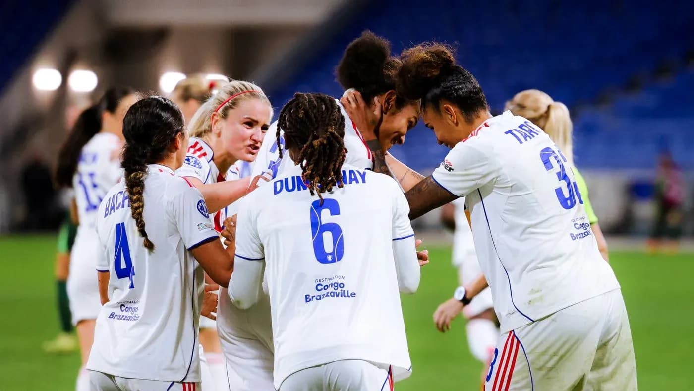 Lyon W celebrating a goal in UEFA Champions League