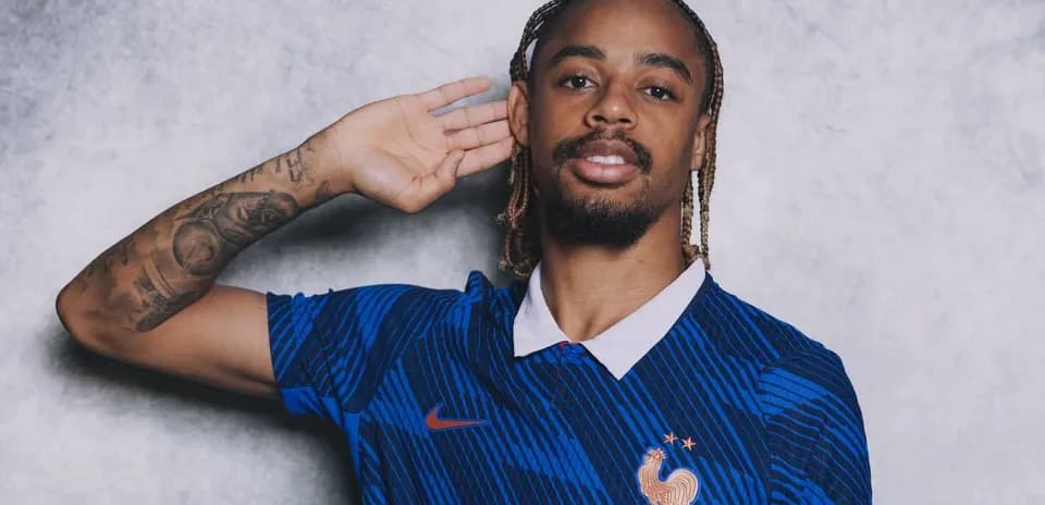 Player posing in France national team jersey