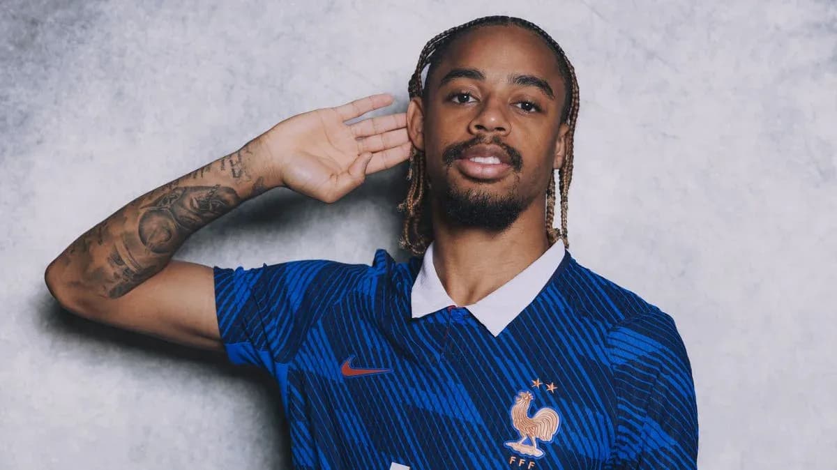 Player posing in France national team jersey
