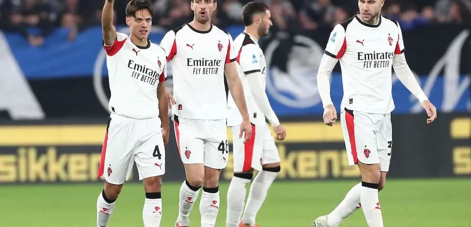 AC Milan players celebrating during match