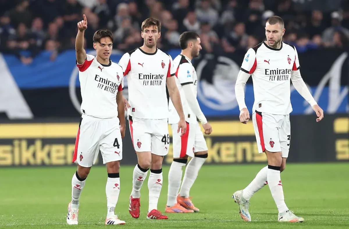 AC Milan players celebrating during match