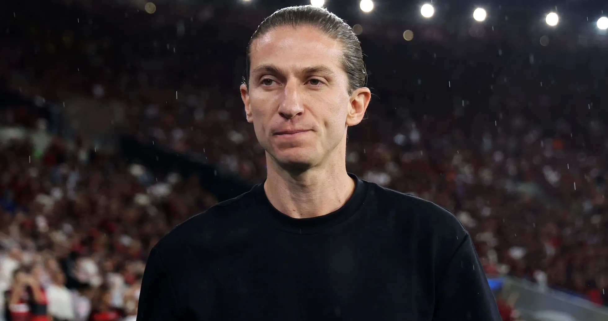 Coach on the sidelines during a match