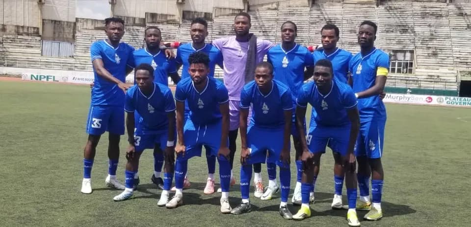 Rivers United team posing before the match