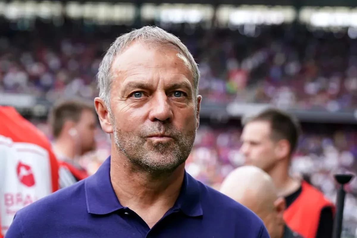Coach looking on during match in stadium