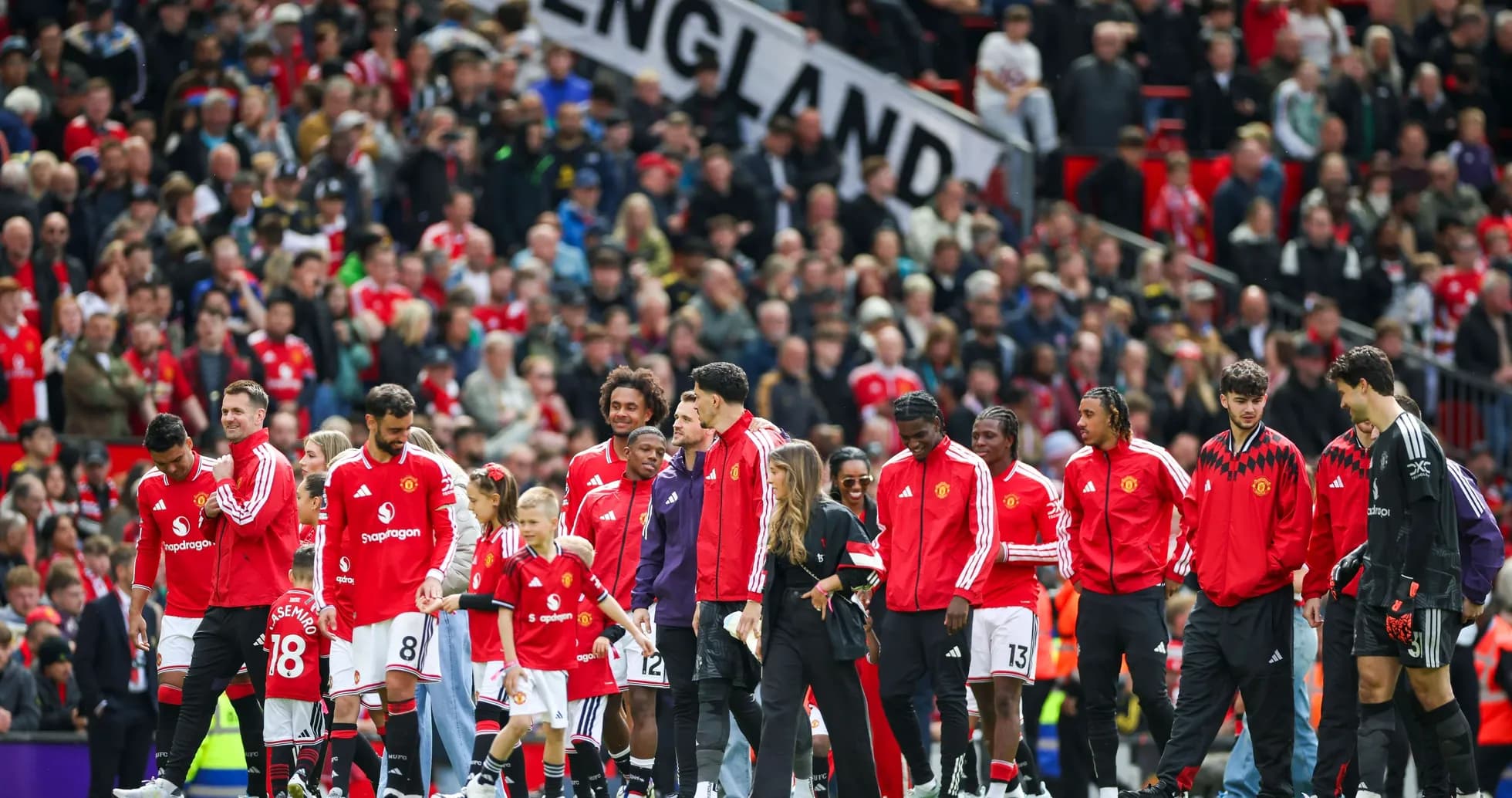 Manchester United players walking onto the pitch