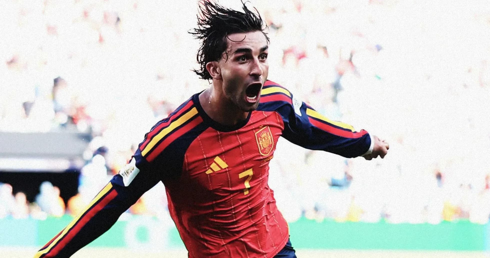 Player celebrating a goal in Spain jersey