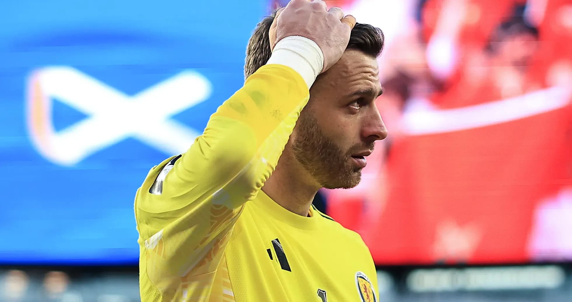 Goalkeeper in yellow jersey during match