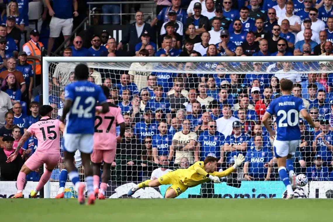 Goalkeeper diving to save a penalty kick
