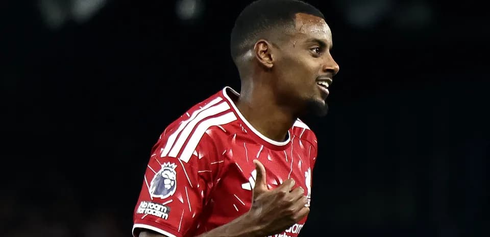 Player celebrating a goal in red team jersey