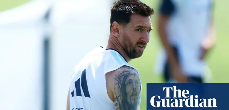 Lionel Messi training with team on the pitch