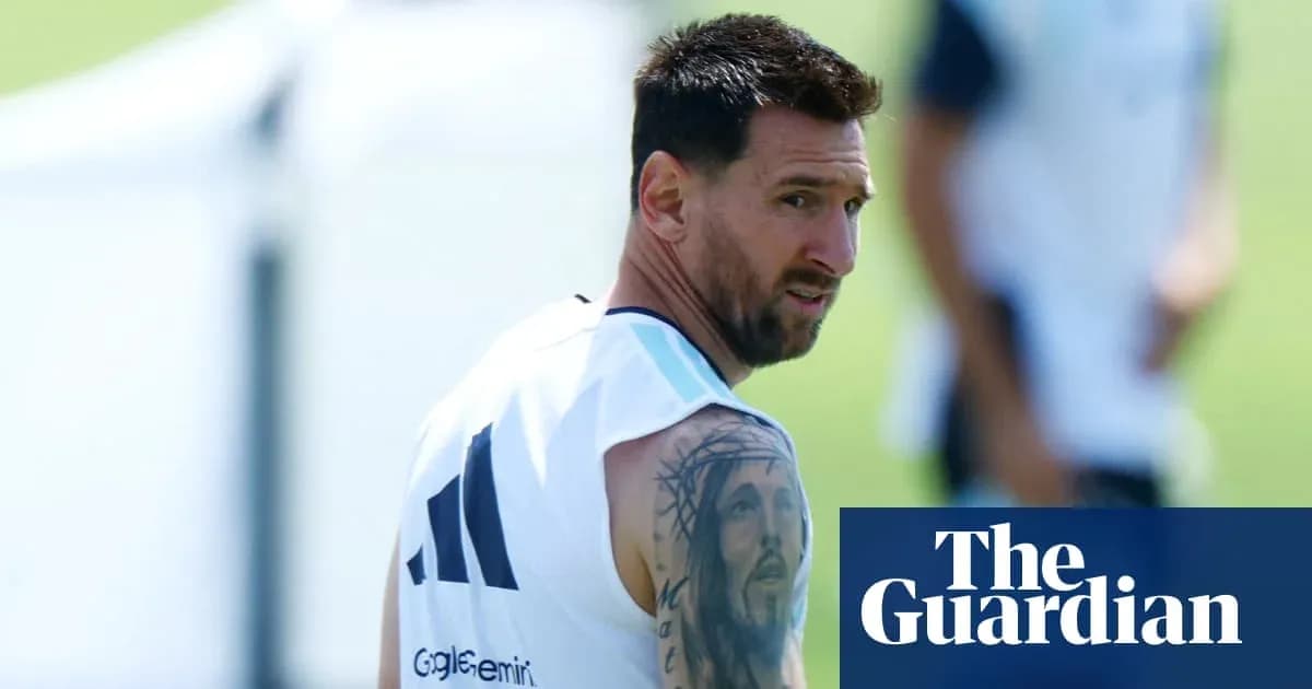 Lionel Messi training with team on the pitch