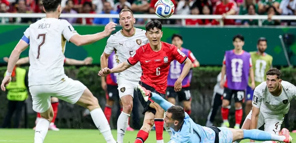 South Korea player attempting to score against Czech Republic