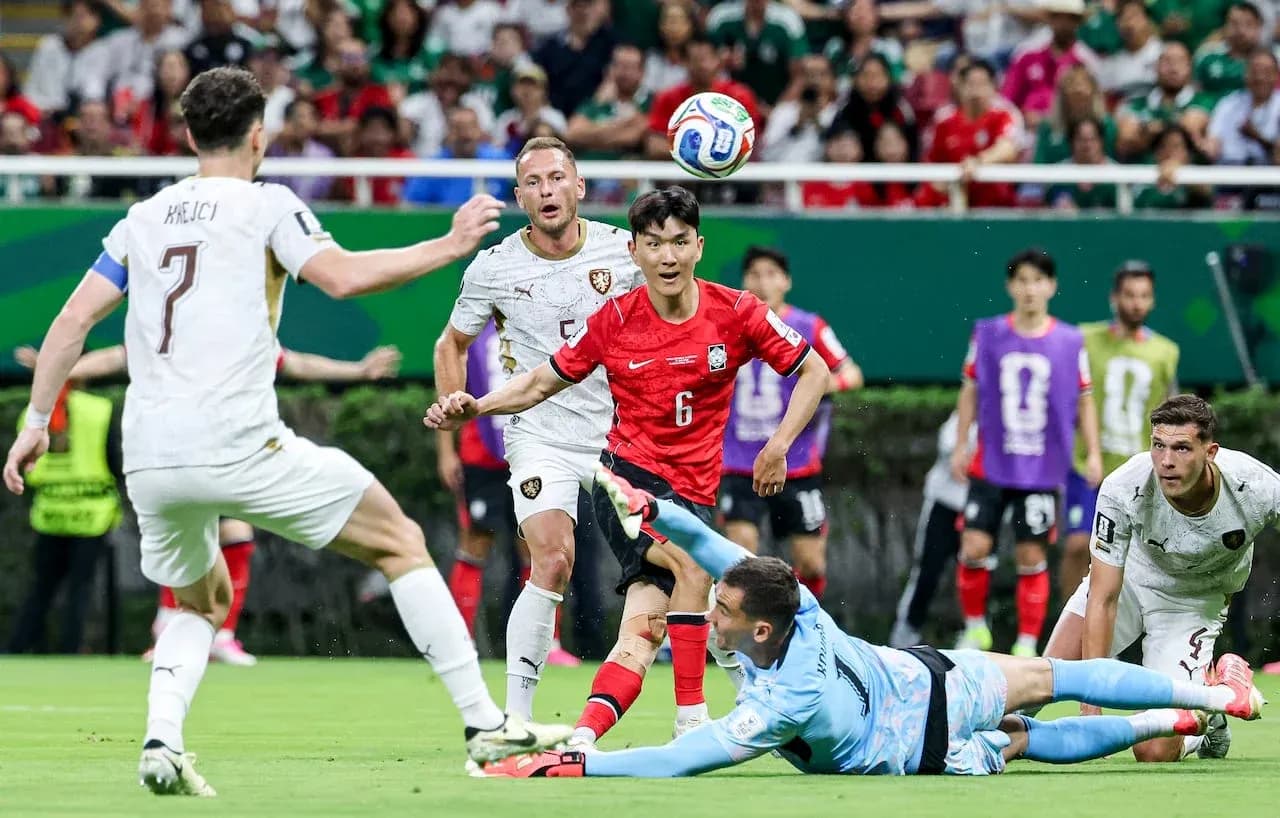 South Korea player attempting to score against Czech Republic