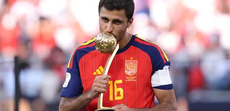 Player holding trophy after winning the match