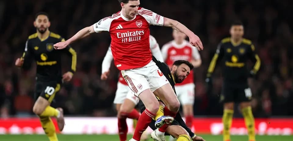 Arsenal player tackled during match at Emirates Stadium