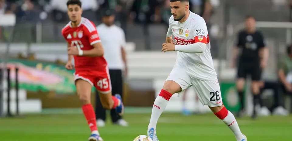 Player dribbling the ball during a soccer match